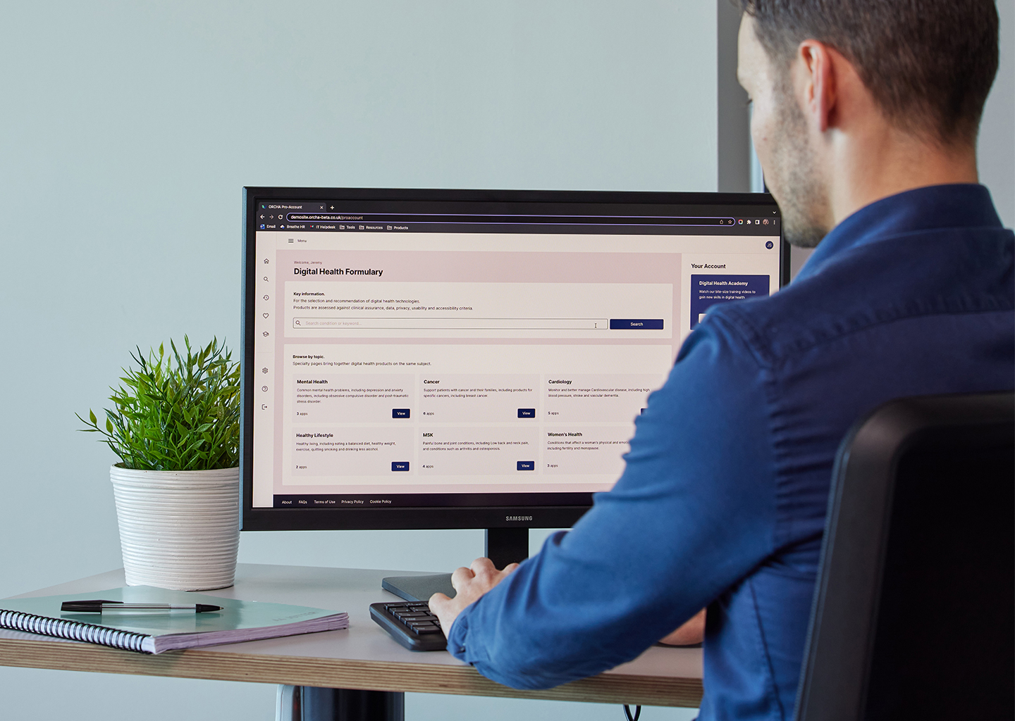 GP looks at ORCHA Digital Health Formulary on a desktop computer screen